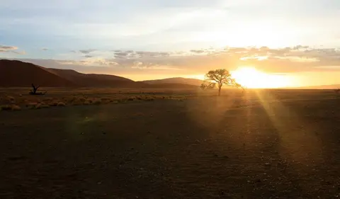 Afrika Reisen: Namibia Sonnenuntergang ©Juergen Goetz